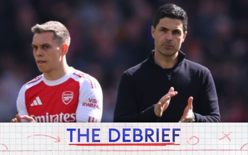 Dejected Arsenal football players on the pitch during a Premier League match