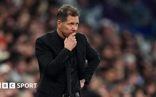 Atletico Madrid manager Diego Simeone standing thoughtfully on the touchline during a La Liga match
