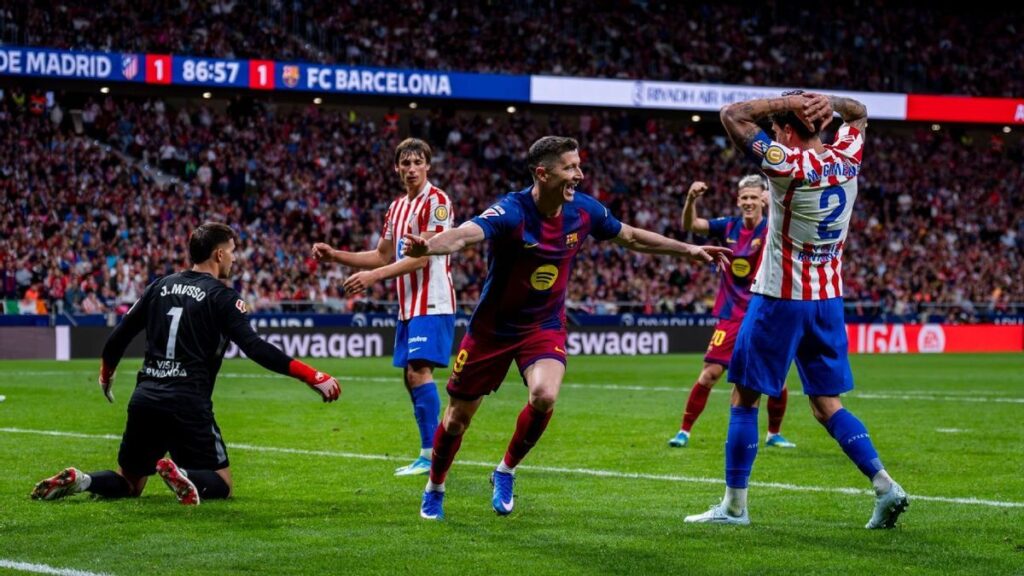 Barcelona players celebrating a goal against Atletico Madrid in LaLiga
