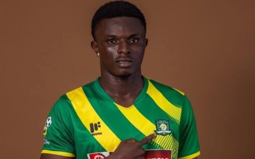 Berekum Chelsea team crest alongside a general view of a Ghanaian football pitch