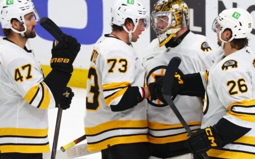 Boston Bruins goaltender Jeremy Swayman making a save against the Buffalo Sabres