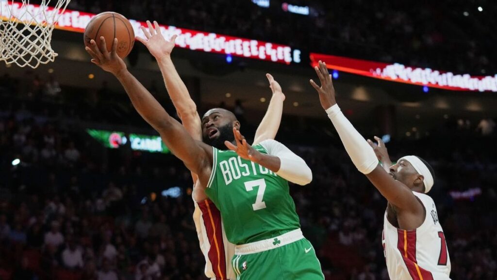 Jayson Tatum and Jaylen Brown of the Boston Celtics celebrating on the basketball court