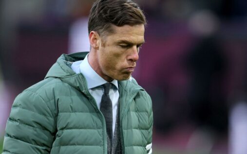 Burnley manager Scott Parker looking dejected on the touchline during a Premier League match