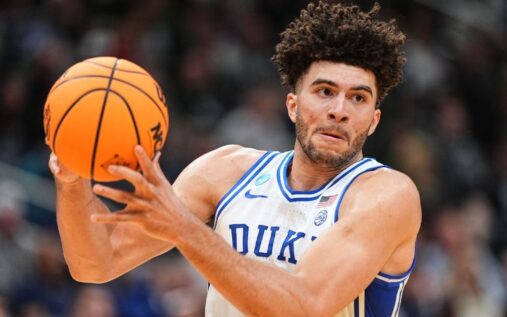 Duke freshman Cameron Boozer dribbling the basketball during an NCAA match