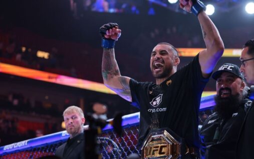 UFC light heavyweight champion Carlos Ulberg celebrating a knockout victory inside the octagon