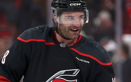 Carolina Hurricanes forward Jordan Martinook celebrating his game-winning goal on the ice