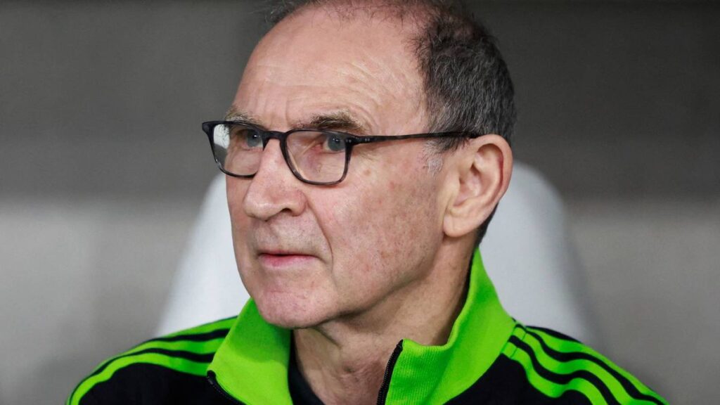 Liverpool defender Andy Robertson looking thoughtful on the pitch