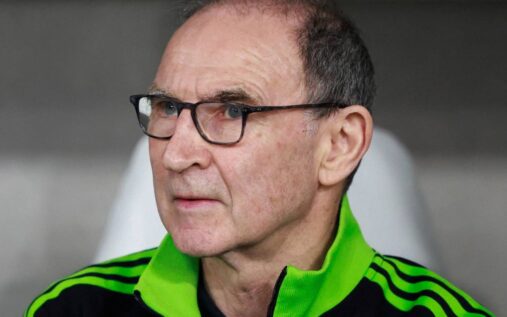 Liverpool defender Andy Robertson looking thoughtful on the pitch