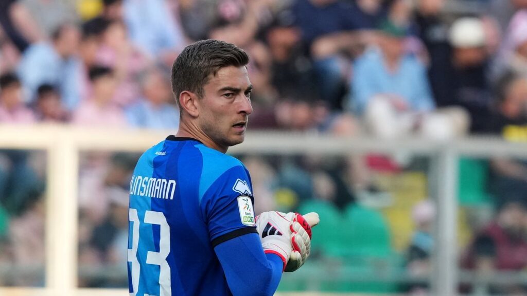 Jonathan Klinsmann receiving medical attention on the pitch during a Serie B match