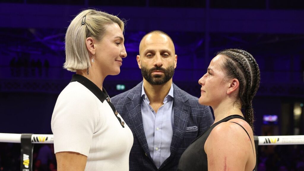 Chantelle Cameron celebrating her WBO super-welterweight world title victory in the boxing ring