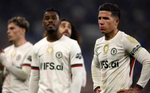 Dejected Chelsea players walking off the pitch following a Premier League defeat