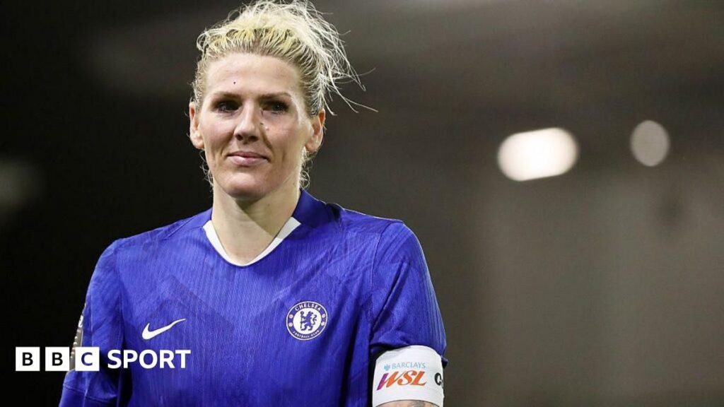 Millie Bright wearing the Chelsea captain's armband on the pitch