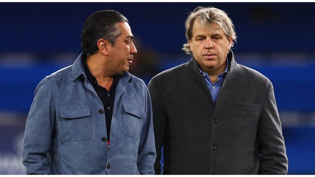 Frank Lampard sitting alongside Behdad Eghbali in the stands at Stamford Bridge