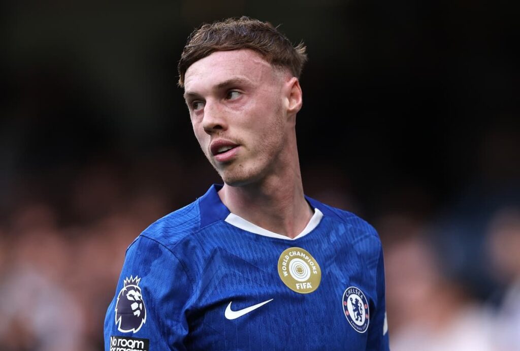 Chelsea forward Cole Palmer looking determined on the pitch during a Premier League match