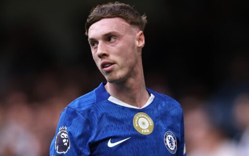 Chelsea forward Cole Palmer looking determined on the pitch during a Premier League match