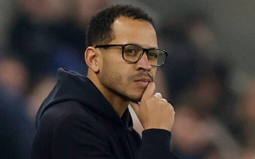 Chelsea manager Liam Rosenior looking serious on the touchline during a match