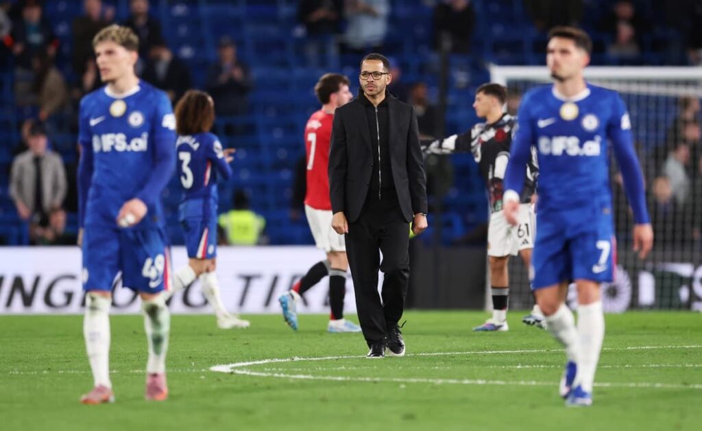 Dejected Chelsea players react to conceding a goal against Manchester United at Stamford Bridge