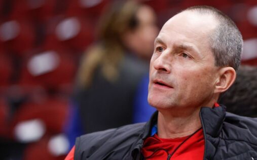Chicago Bulls team logo displayed prominently on a hardwood basketball court