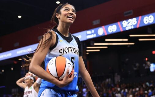 Angel Reese playing basketball in a Chicago Sky uniform during a WNBA game