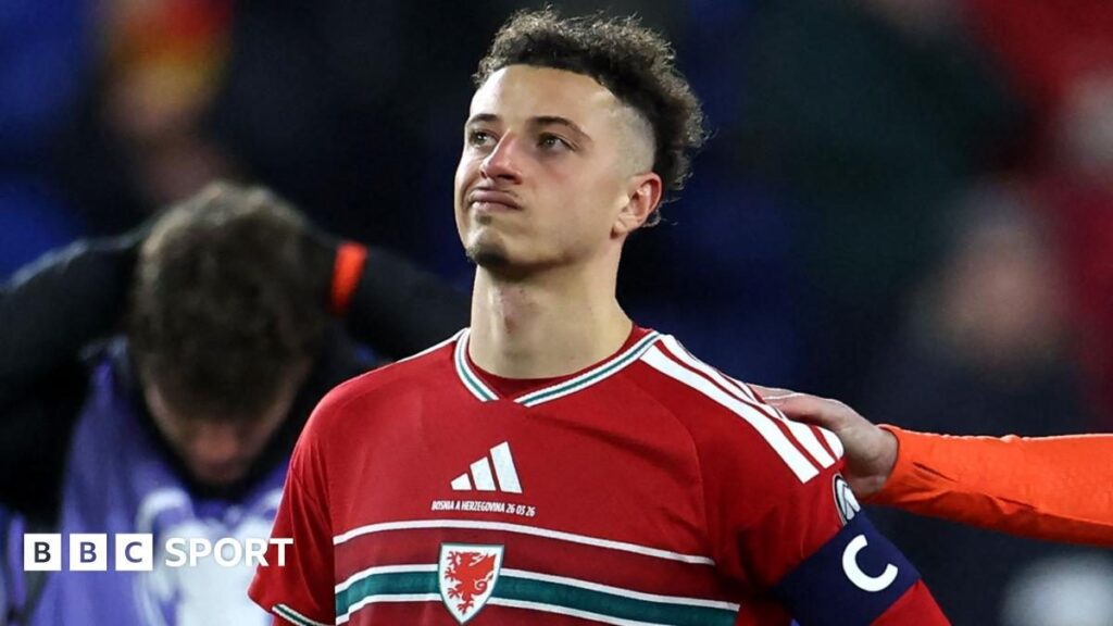 Wales manager Craig Bellamy looking thoughtful on the touchline during an international match