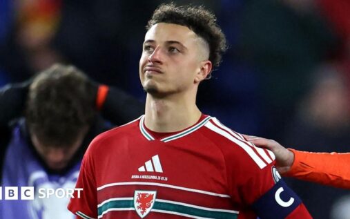 Wales manager Craig Bellamy looking thoughtful on the touchline during an international match