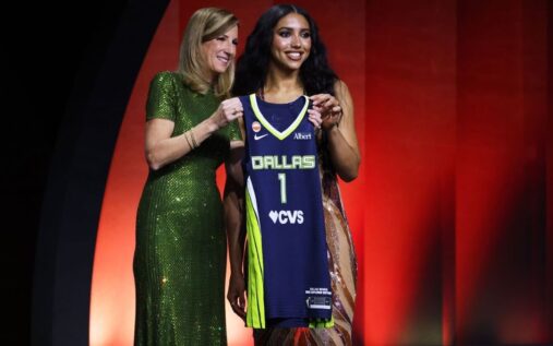 Azzi Fudd smiling after being selected as the number one overall pick by the Dallas Wings at the WNBA draft