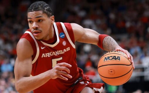 Arkansas guard Darius Acuff Jr dribbling the basketball during an NCAA college game