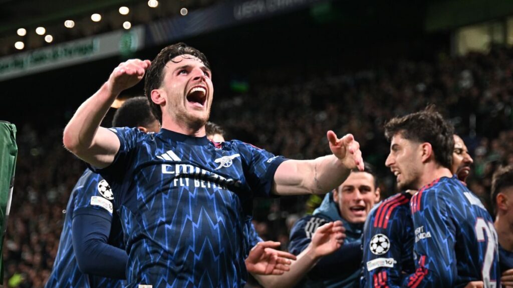 Declan Rice controlling the ball in midfield for Arsenal during their Champions League match against Sporting Lisbon