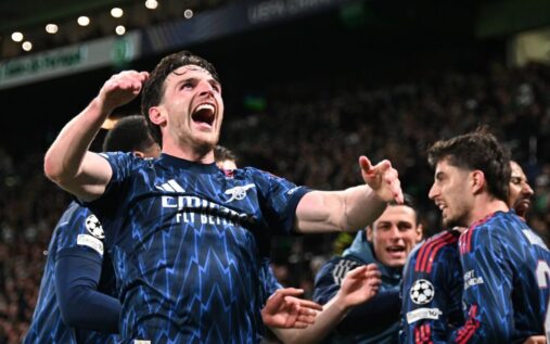 Declan Rice controlling the ball in midfield for Arsenal during their Champions League match against Sporting Lisbon