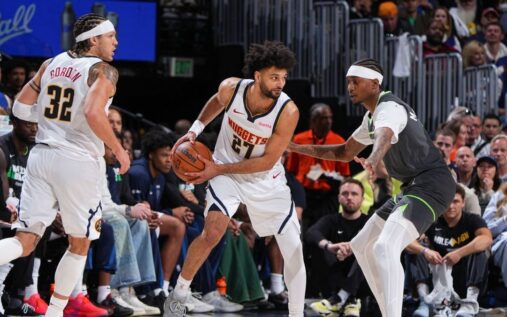 Jamal Murray of the Denver Nuggets dribbling the basketball during an NBA playoff game against the Timberwolves