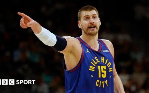 Nikola Jokic of the Denver Nuggets handling the basketball during an NBA game