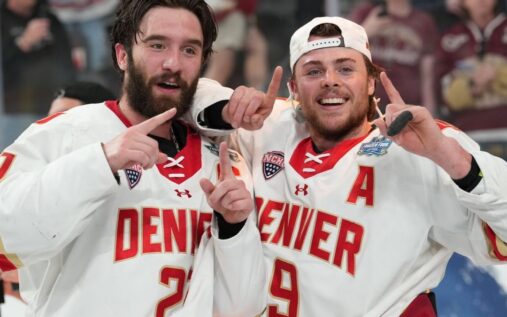 Denver Pioneers men's ice hockey players celebrating their NCAA national championship victory