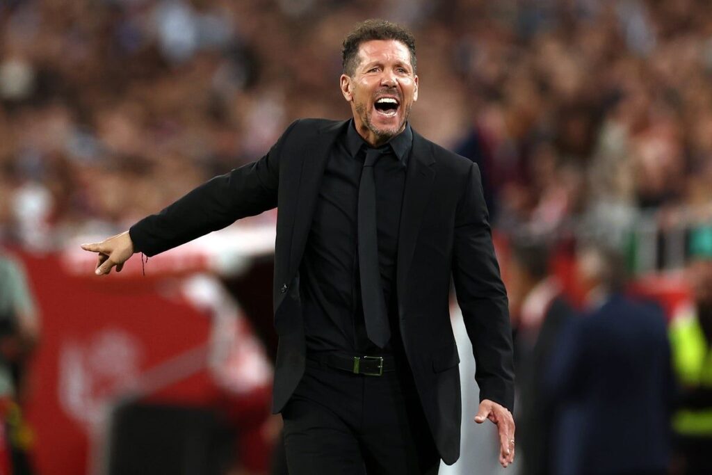 Diego Simeone gesturing on the touchline during an Atletico Madrid match