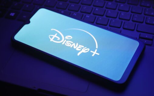 The UEFA Champions League trophy illuminated under bright stadium lights