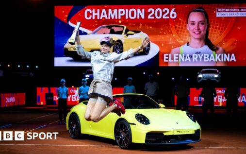 Elena Rybakina holding the Stuttgart Open championship trophy after defeating Karolina Muchova