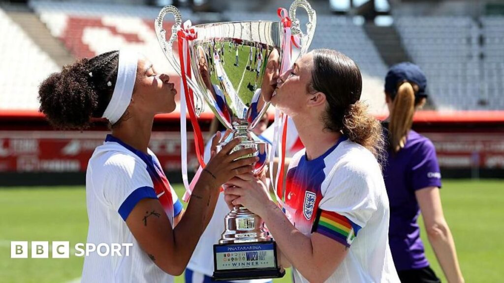 England Women Under-23s football team celebrating their victory with the European Competition trophy