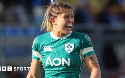 Ireland rugby captain Erin King passing the ball during an international match
