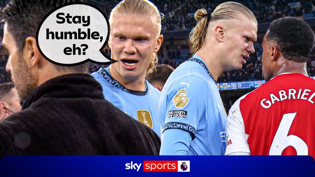 Erling Haaland confronting Arsenal defenders during a Premier League match