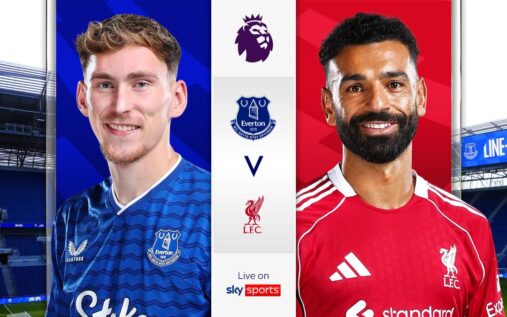 Everton and Liverpool players competing for the ball in a Premier League match