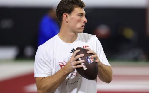Fernando Mendoza throwing a pass in front of NFL scouts at the Indiana Hoosiers pro day