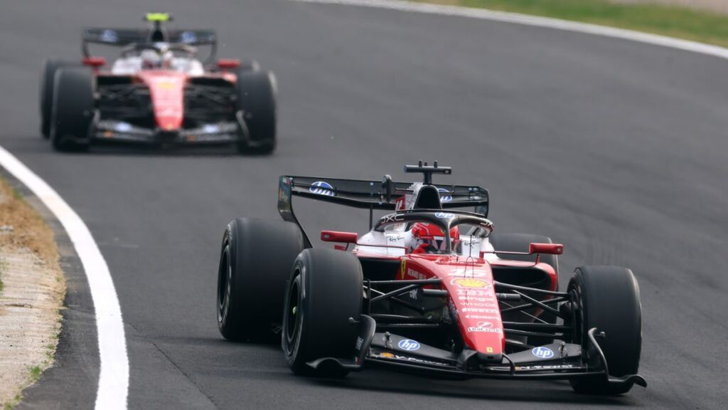 Lewis Hamilton and Charles Leclerc driving their Ferrari Formula 1 cars on track