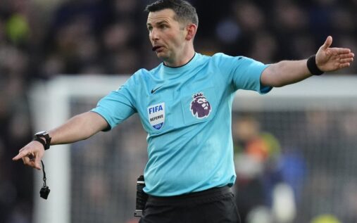 Premier League referee Michael Oliver officiating a football match on the pitch