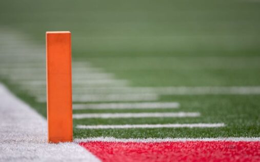 NFL football and legal gavel resting on federal court documents