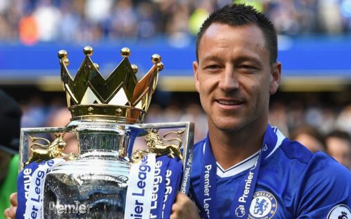 Former Chelsea captain John Terry applauding supporters from the pitch