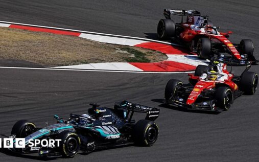Formula 1 cars racing closely on track demonstrating the new hybrid engine regulations