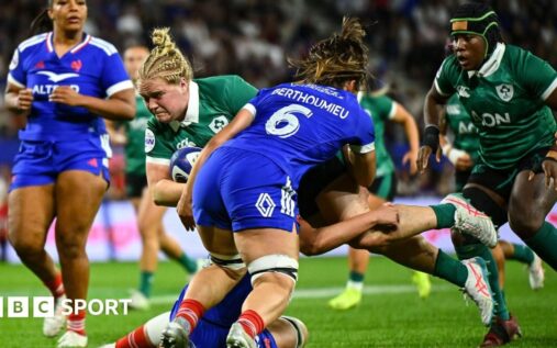 France women's rugby players celebrating a try against Ireland during their Six Nations match in Clermont