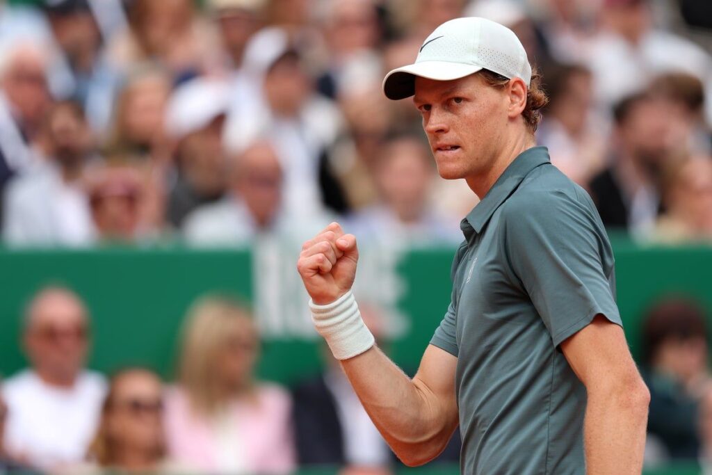 Aryna Sabalenka wearing a fitness tracking band on her wrist during a tennis match