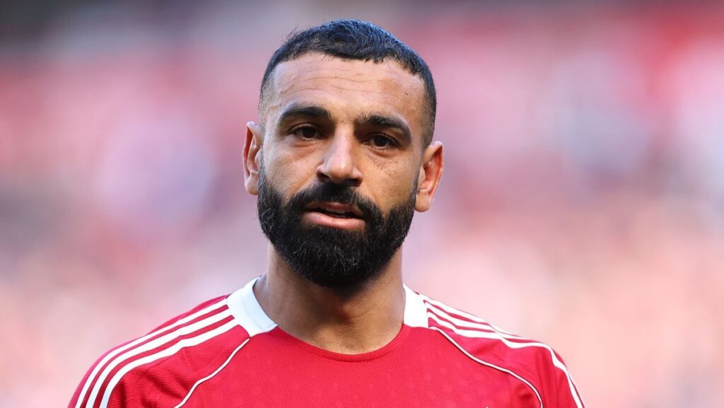 Steven Gerrard looking concerned while speaking to the media