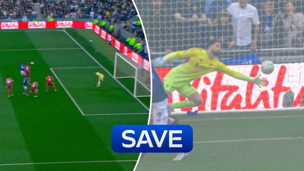 Giorgi Mamardashvili diving at full stretch to make a save