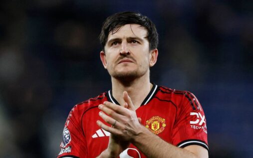 Manchester United defender Harry Maguire walking off the pitch after receiving a red card